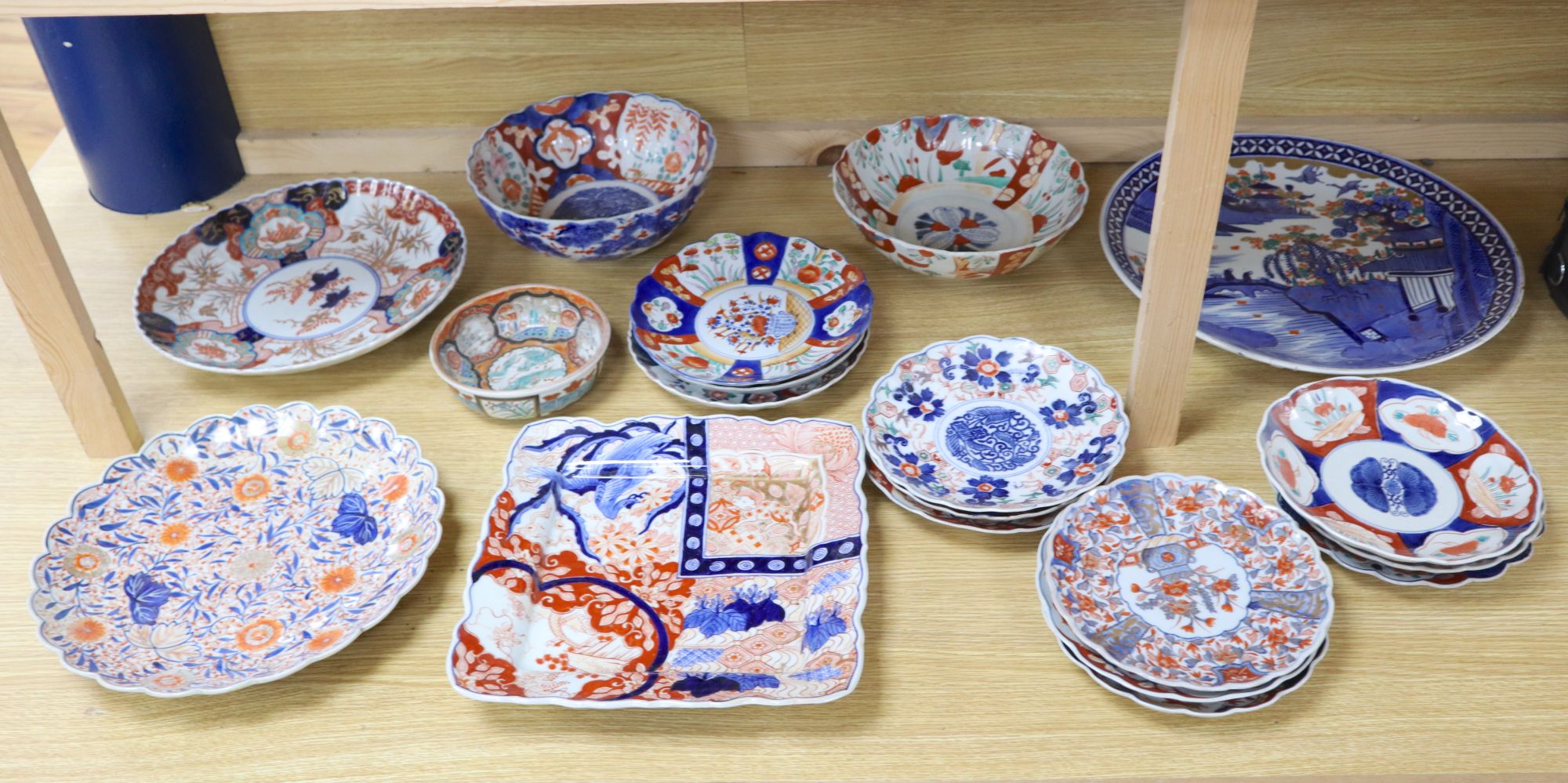 A collection of Japanese Imari dishes, bowls and a large square dish